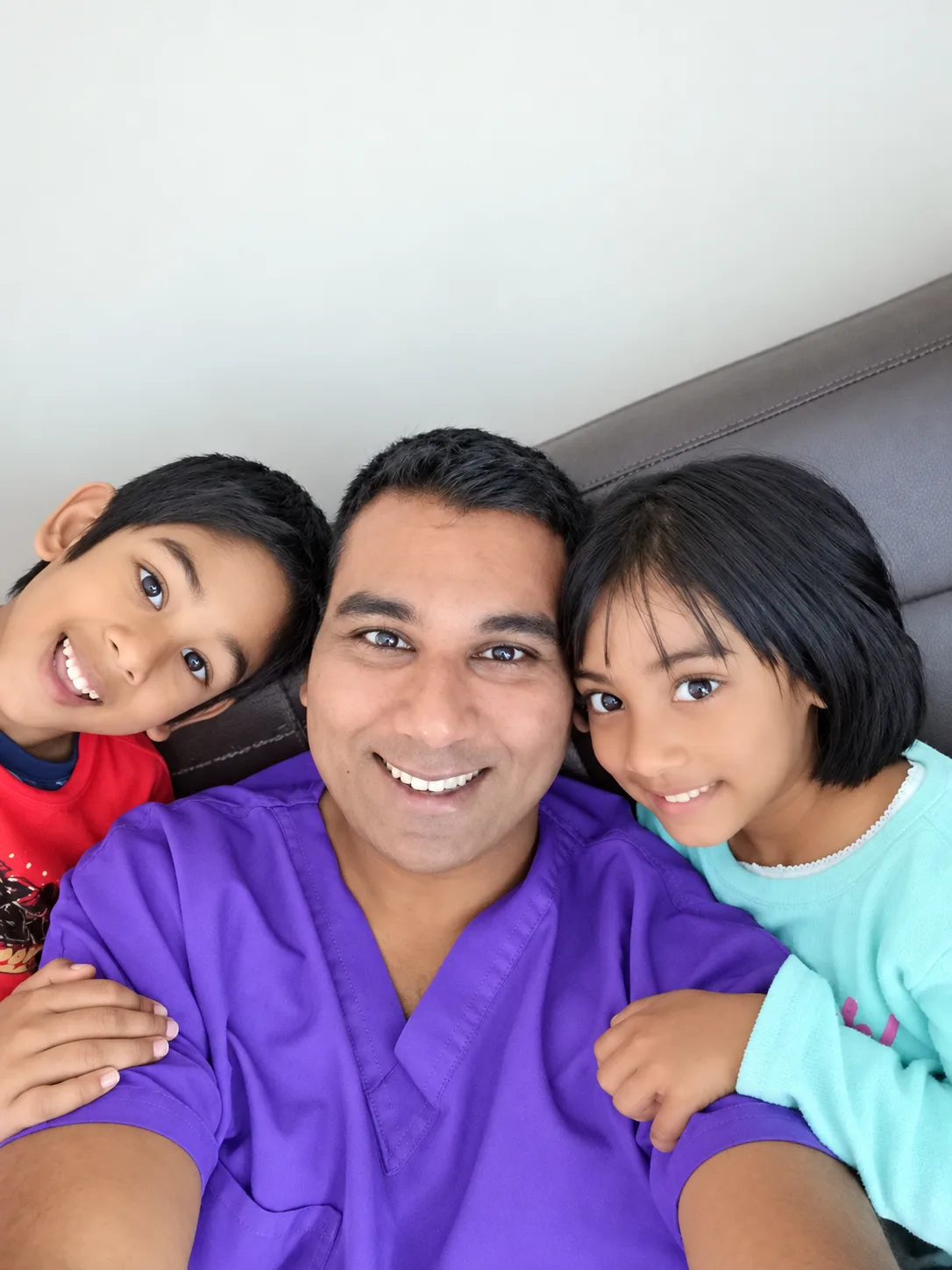 Dr Aylwin David Nathaniel with family